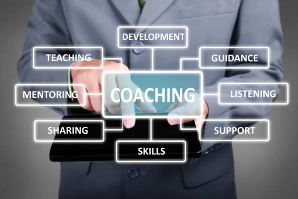 Businessman interacting with a virtual coaching concept interface.