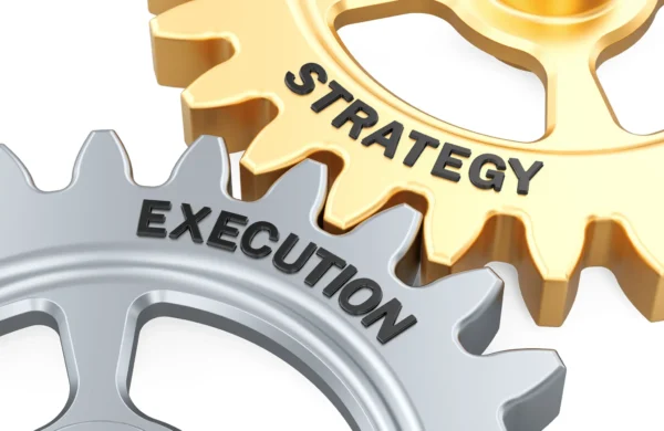 Interlocking gears labeled Strategy and Execution symbolizing business processes.